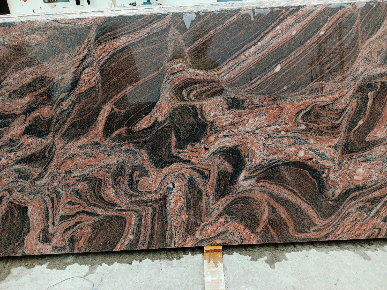 Granite slab on yard floor with book-matched style veining